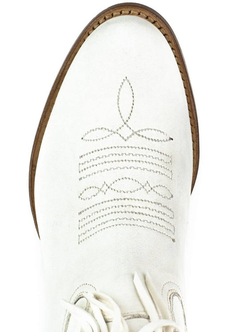 Vêtement en cuir Santiags femme blanc